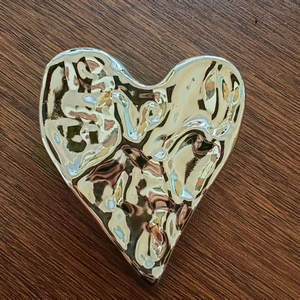 Handcrafted hammered heart brooch with 3D lava texture and golden finish for women