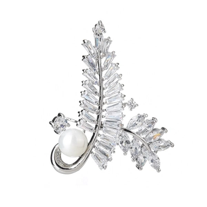 Elegant silver leaf brooch with marquise cubic zirconia and a large white pearl
