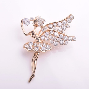 Élégante broche ballerine dorée ornée de cristaux scintillants et de strass brillants