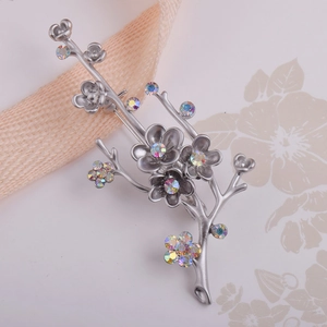 Elegant silver matte plum blossom branch brooch with colorful rhinestones on silk ribbon