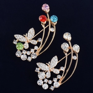 Spille a farfalla eleganti in lega dorata con strass multicolore e bianchi