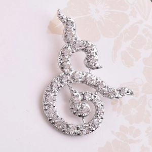 Silver elephant ribbon brooch pin with sparkling rhinestones in an exotic design