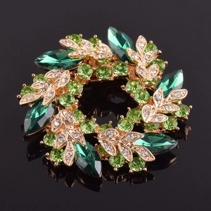 Broche couronne dorée élégante avec cristaux de couleur vert émeraude et vert clair