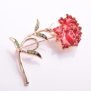 Elegant carnation flower brooch in gold alloy with red enamel and green crystals