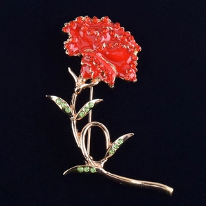 Exquisite carnation brooch with red enamel petals and crystals on a gold alloy base