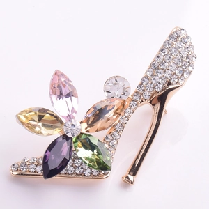 Detail of high-heel brooch with colorful marquise crystals and sparkling rhinestones