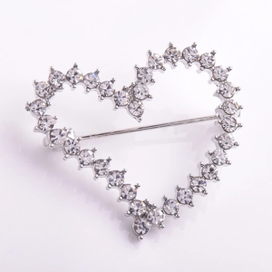 Elegant silver heart brooch with shimmering rhinestones and hollow-out design for women