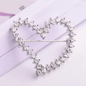 Elegant silver heart brooch with shimmering crystal rhinestones for women clothing decor
