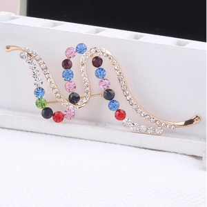 Elegant wave-shaped brooch with colorful rhinestones and gold-plated alloy base
