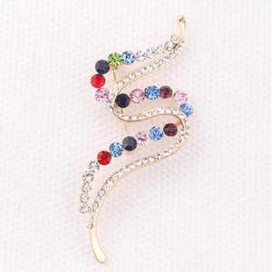 Elegant gold wave brooch with colorful rhinestones in a stylish streamlined design