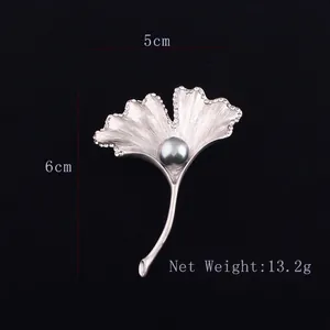 Silver ginkgo leaf brooch with white rhinestones and a dark grey pearl 5cm x 6cm