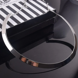 Detailed view of punk style silver alloy choker collar with adjustable lobster clasp chain