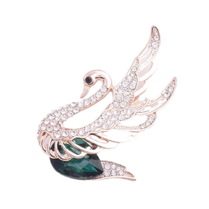 Broche cygne élégante en or rose avec cristaux blancs et une grande pierre verte