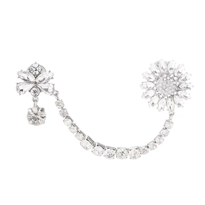 Elegante spilla floreale con cristalli ambra blu e catena d'argento scintillante