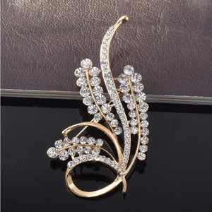 Élégante broche fleur en cristal doré avec strass scintillants pour vêtements femmes