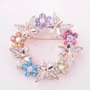 Elegant rose gold butterfly and flower wreath brooch with colorful rhinestones