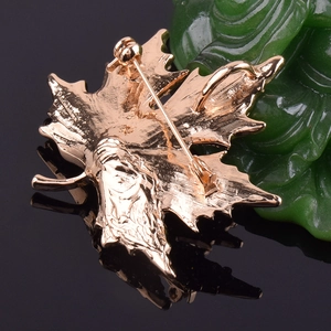 Detail of rose gold maple leaf brooch back with pin and pendant hook attachment