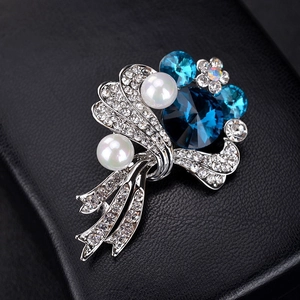 Elegant silver bouquet brooch with large blue crystal, pearls and small pavé diamonds