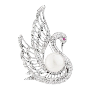Elegant silver swan brooch with white zircon wing detail and a large center pearl