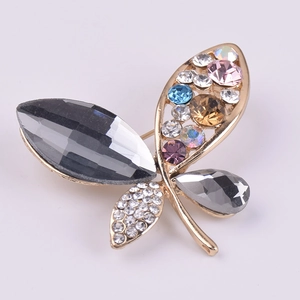 Elegant butterfly brooch with multi-color crystals and grey gemstones on gold base
