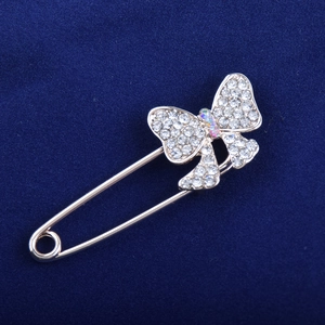 Elegant butterfly safety pin brooch with sparkling rhinestones and rose gold metal finish