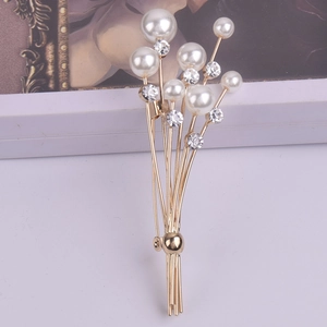 Broche bouquet élégante avec finition dorée, perles et strass pour accessoires femme