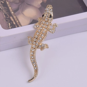 Sparkling crystal crocodile brooch in gold-plated alloy with white rhinestones for wedding