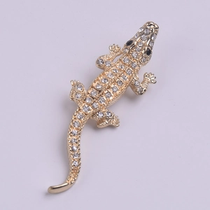 Sparkling rhinestone crocodile brooch in gold-tone alloy with crystal animal jewelry design