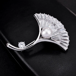 Elegant ginkgo leaf brooch with cubic zirconia crystals and white pearl accent