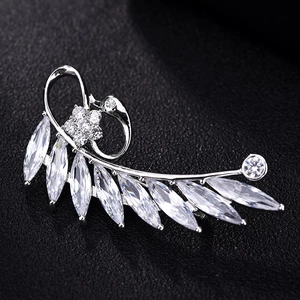 Elegant swan-shaped silver brooch with marquise-cut AAA cubic zirconia on black fabric