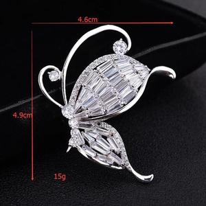 Macro view of silver butterfly brooch with white cubic zirconia, size 4.6cm by 4.9cm