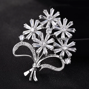 Elegant silver flower bouquet brooch with sparkling zircon crystals and ribbon bow