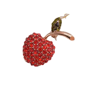 Broche élégante en forme de pomme avec cristaux rouges et verts sur métal doré