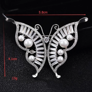 Detail view showing dimensions of silver butterfly brooch with zircons and pearls