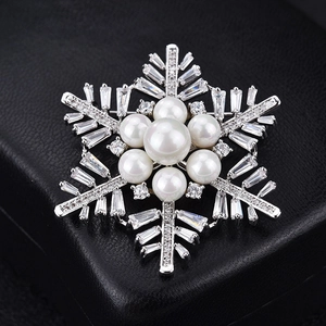 Elegant silver snowflake brooch with pearls and cubic zirconia crystals for Christmas gifts