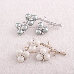 Elegant floral branch brooch with shell pearls and rhinestones in gold and silver plating