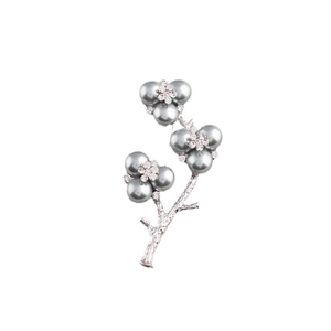 Elegant silver flower branch brooch with grey pearls and sparkling crystals on white base