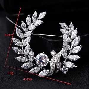 Detailed macro view of crystal wreath brooch with 4.3cm diameter and secure pin back