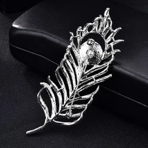 Elegant silver feather brooch with crystal rhinestone on black leather gift box