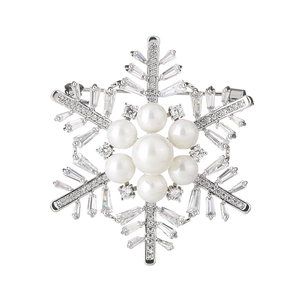 Silver snowflake brooch with pearls and zircon crystals for sweaters and suits