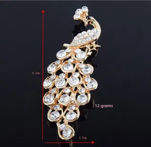 Detail view of crystal peacock brooch with dimensions of 6.2cm long and 12g weight