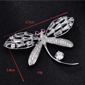 Detailed dragonfly brooch dimensions showing length 5.7cm, width 3.8cm, and weight 14g