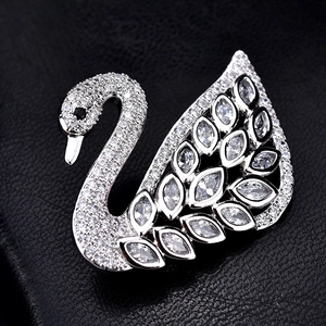 Luxury crystal swan brooch with marquise-cut stones and silver-tone finish