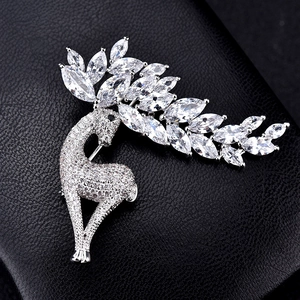 Elegant silver deer brooch with sparkling marquise-cut crystals and zircon on black leather