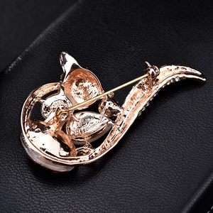 Cute fox brooch pin with cat eye stone and rose gold plating back view with safety clasp