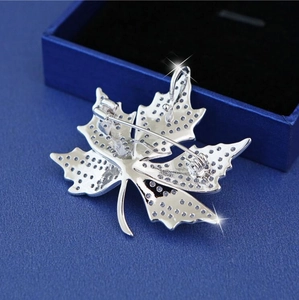 Detailed back view of S925 sterling silver maple leaf brooch with secure pin and pendant loop