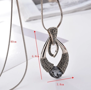 Detail of grey crystal pendant necklace with 80cm chain and teardrop design