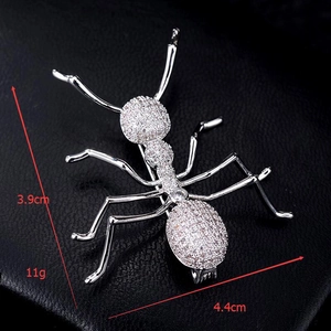 Detailed macro view of zircon-studded ant brooch showing dimensions 4.4cm by 3.9cm