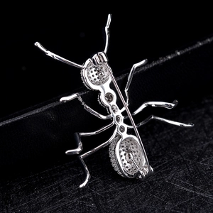 Back view of silver ant brooch with zircon micro-pave and secure safety pin clasp