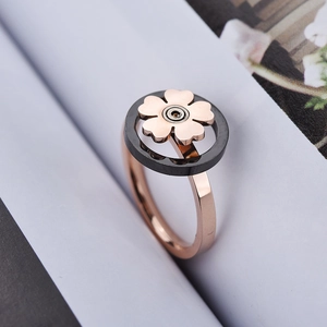 Rotating snowflake rotating ring in rose gold and black finish for women